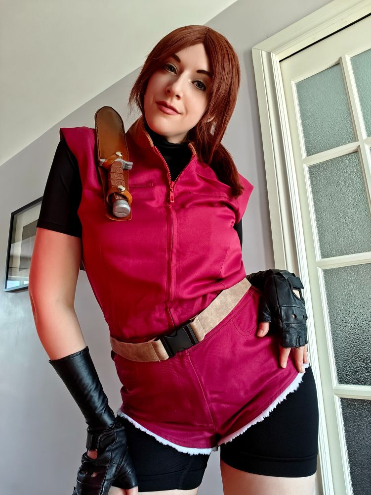 Sheenah is cosplaying as Claire Redfield from the video game Resident Evil 2 (1998). 
