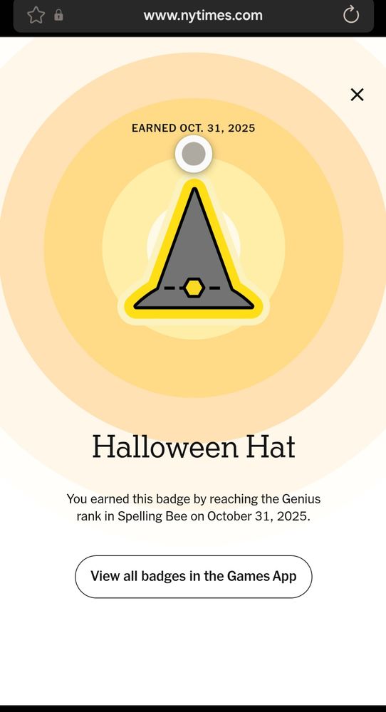 Screen grab showing the Halloween hat badge from the spelling bee online game