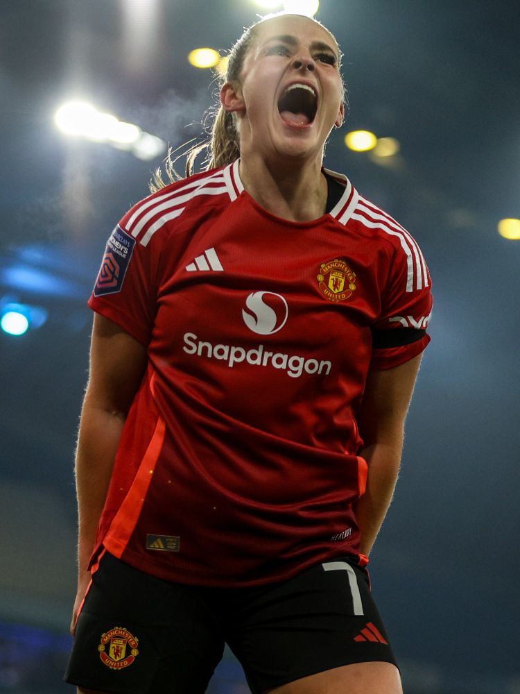 Ella Toone celebrates one of her three goals for Manchester United against Manchester City