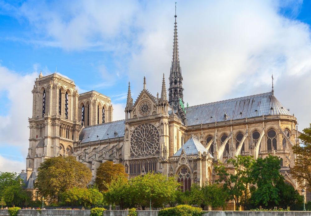  cathedral under blue skies and with green trees. 
Notre-Dame de Paris
Gothic cathedral Notre-Dame de Paris, as viewed from across the Seine River, c. 2015.
© eugenesergeev—iStock/Getty Images
