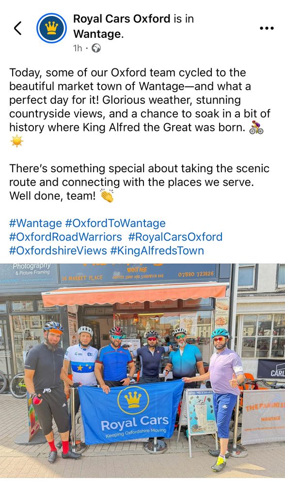 A photo of the Royal Cars sign and 6 man strong cycling team in road cycling gear nect to it.