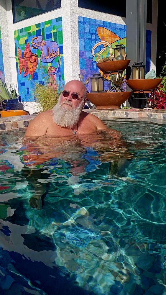 Dad soaking in the hot tub. 