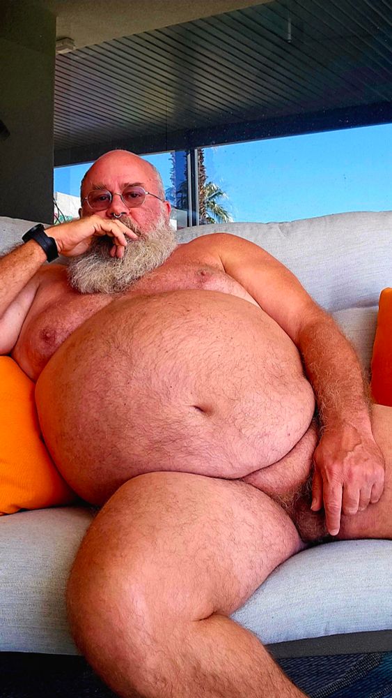 Naked Dad on the patio couch. 