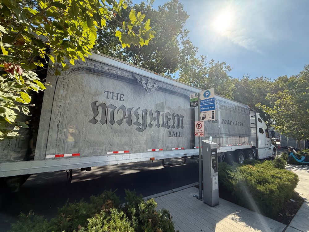 The Mayhem Ball tour truck parked outside the arena.