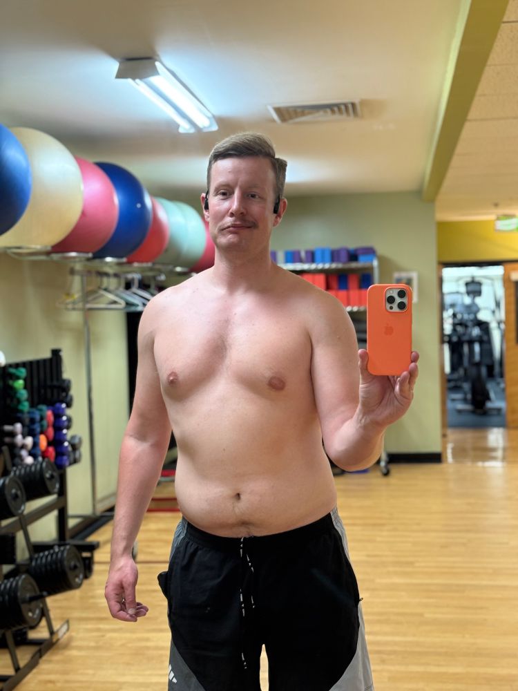 Another selfie of me at the gym shirtless. Some guy was eyeing me while I took the picture so my expression is a bit odd. Mind your business people!