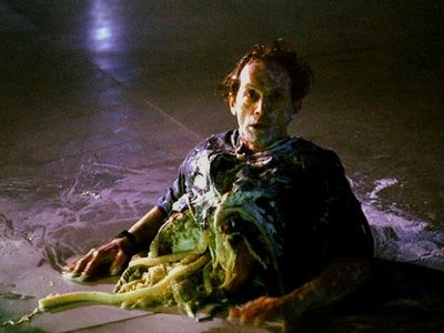 Bishop from aliens cut in half and dying.