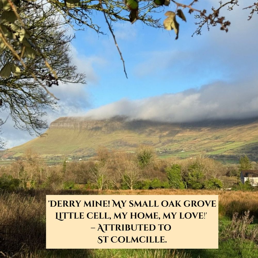 A picture of a landscape in Derry, Northern Ireland. In front of it is a quote attributed to St Colmcille about Derry. 