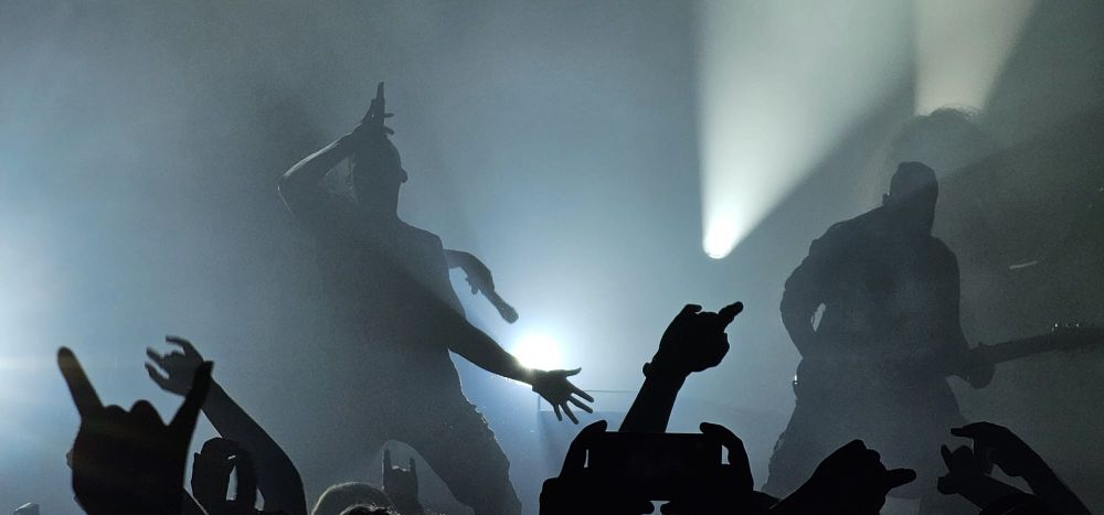 Picture of the band members of Bloodywood: Rap Raoul Kerr, guitarist Karan Katiyar, bassist Roshan Roy