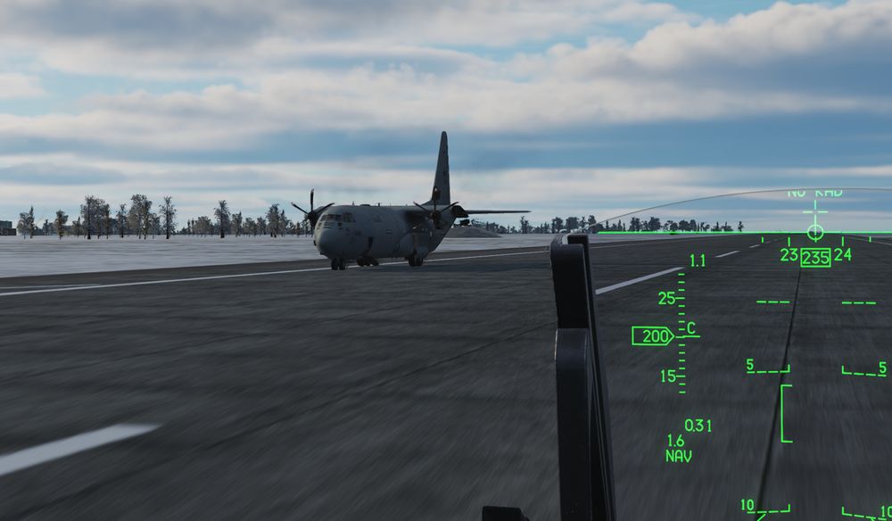 C-130 taxiing down the runway missing wings.