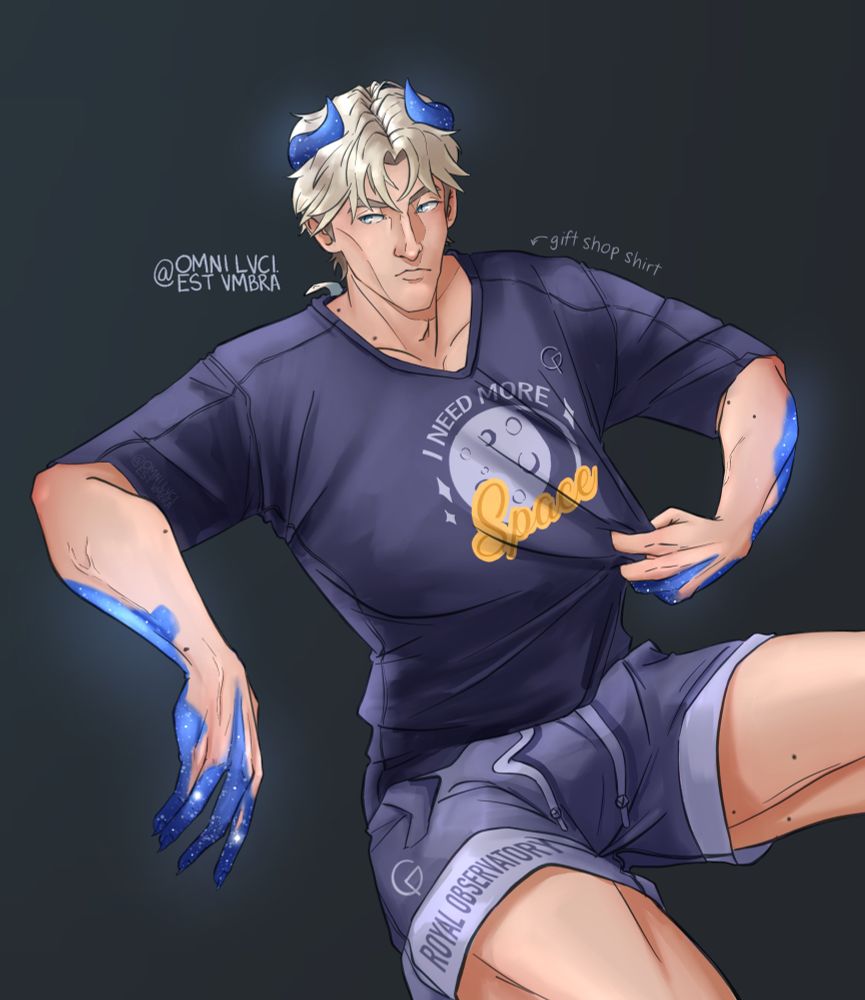 ⭐️Draco wearing a large baggy shirt (I Need More Space written on it) and shorts from the Greenwich Royal Observatory gift shop. He is beginning to turn blue and his horns are growing a bit. 