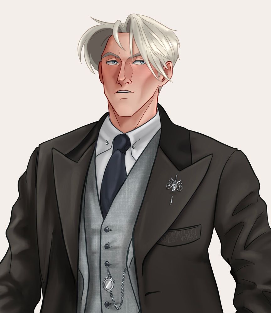 Close up of previous to show pocket watch and Malfoy pin on lapel of jacket better 