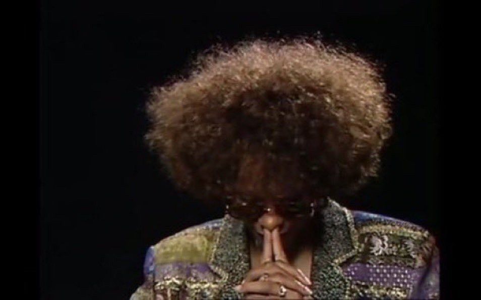 Whitney Houston taking a moment 