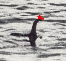 The loch ness monster wearing a red hat I drew on