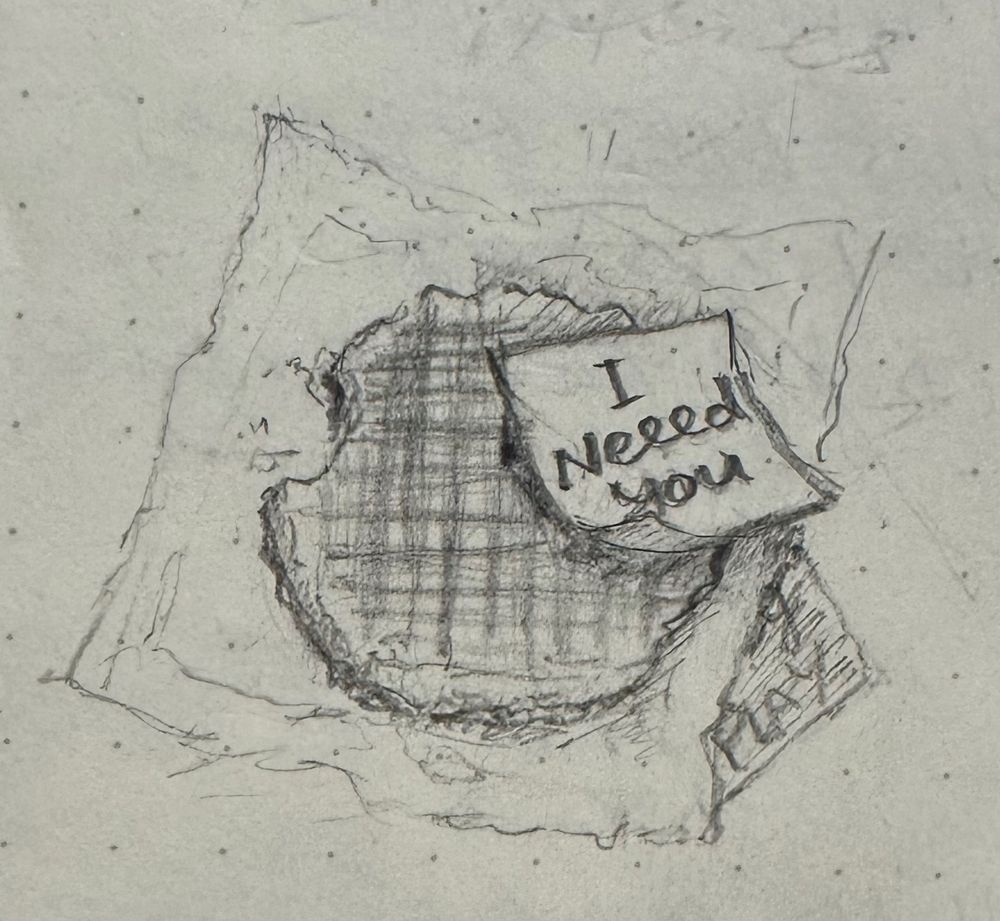 Graphite pencil sketch of a stroopwafel sittin on a napkin - a post it note on top reads ‘I neeed you’. Another can barely be seen underneath, with the second half of Tom’s sentence, ‘to be in my play’. 