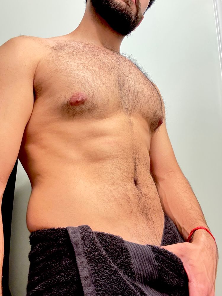 Shirtless chaos in a black towel