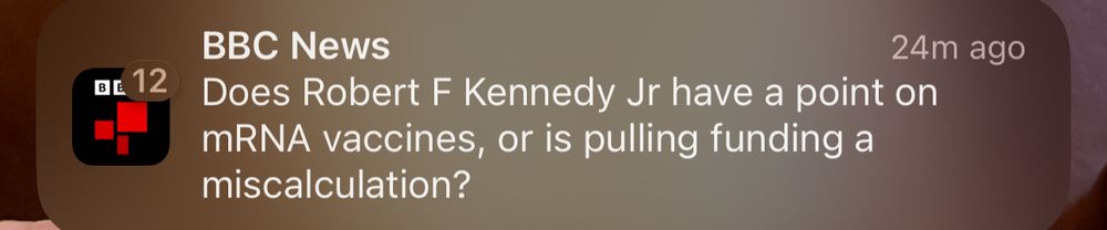 BBC News app notification reading “Does Robert F Kennedy Jr have a point on mRNA vaccines, or is pulling funding a miscalculation?