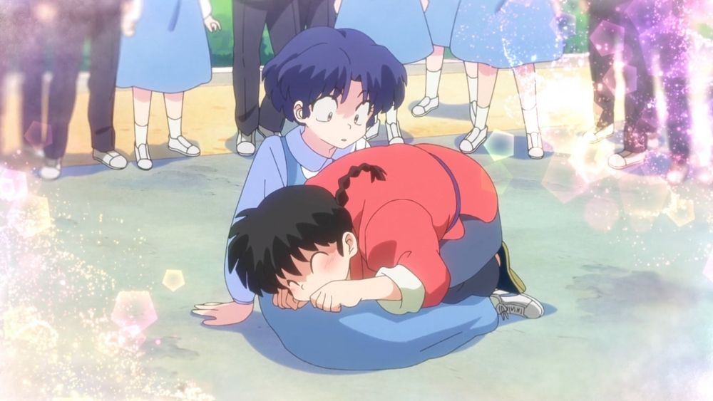 Cat Ranma in Akane’s lap 