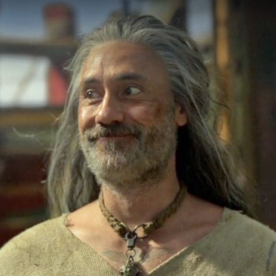 Taika as Ed looking like the cutest kitten to ever where a bell.  Her Majesty the Wig looks particularly splendid in this one. 