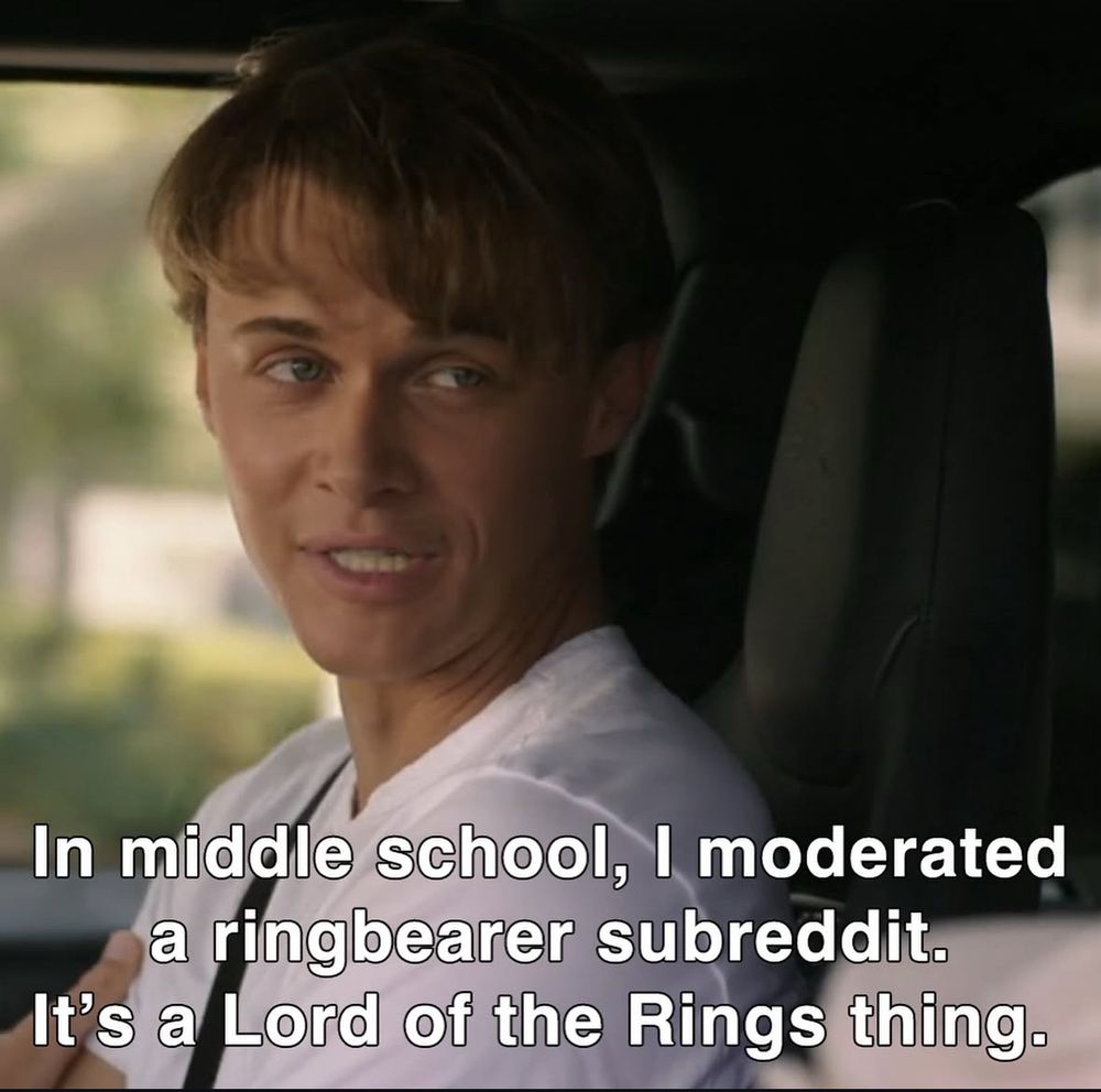 Boy in white shirt in passenger seat of car with subtitles saying “In middle school, I moderated a ring bearer subreddit. It’s a Lord of the Rings thing.”