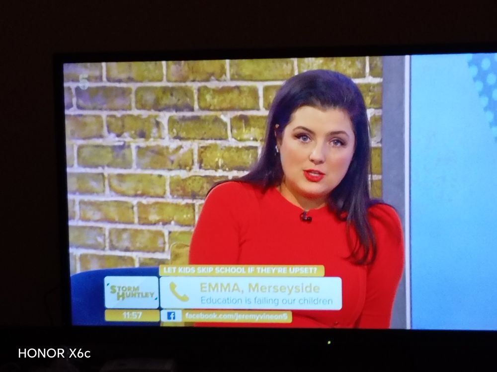 Caption of a racist Scottish woman called storm Huntley, with an orange box saying, let kids skip school it they're upset