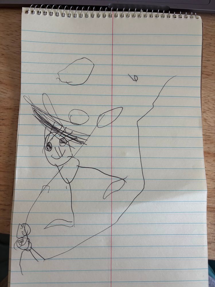 4 year old drawing of stick person with big eyes 