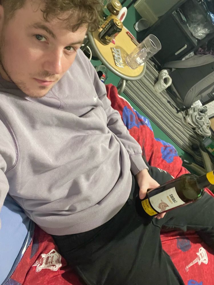 I am suggestively holding a wine bottle. It is roughly the same size fyi