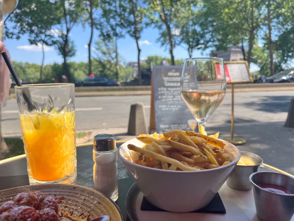 Wine and fries with the Eiffel Tower in the background 