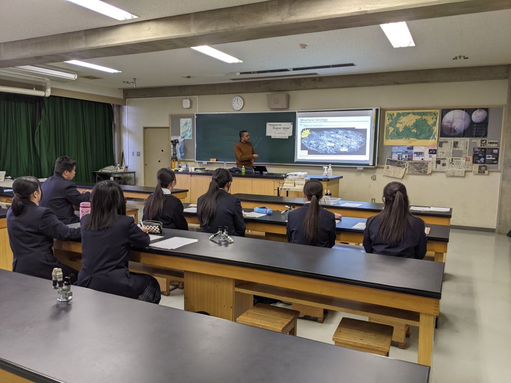 The lecturer describing a petrographic thin section.