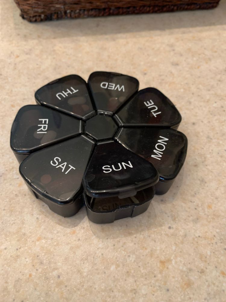 It’s a daily pill holder, with Sunday open as I took my morning pills. 
