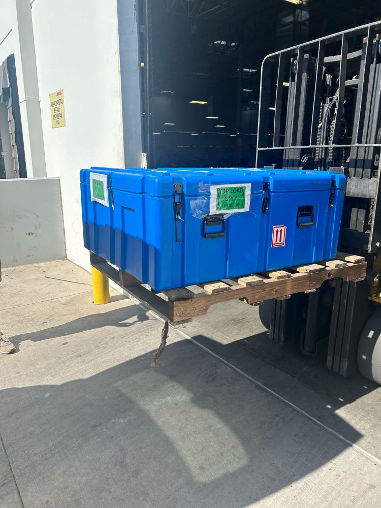 Massive blue box, being freed from customs