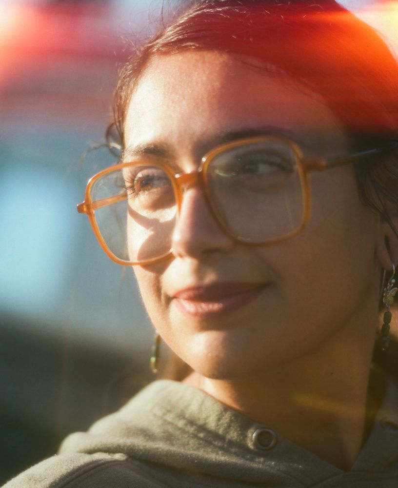 My incredible partner Cassandra looking beautiful. A bit of red weirdness at the top of the frame that I love. Maybe a light leak or I didn’t handle the roll right when I was transporting it to get developed. 