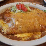a Loborito plate. A burrito absolutely slathered with sauce and cheese