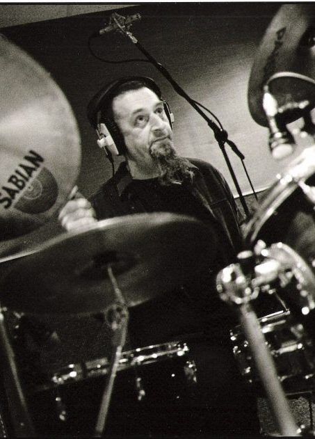 A member of the Blue Vanguard Jazz playing an instrument.