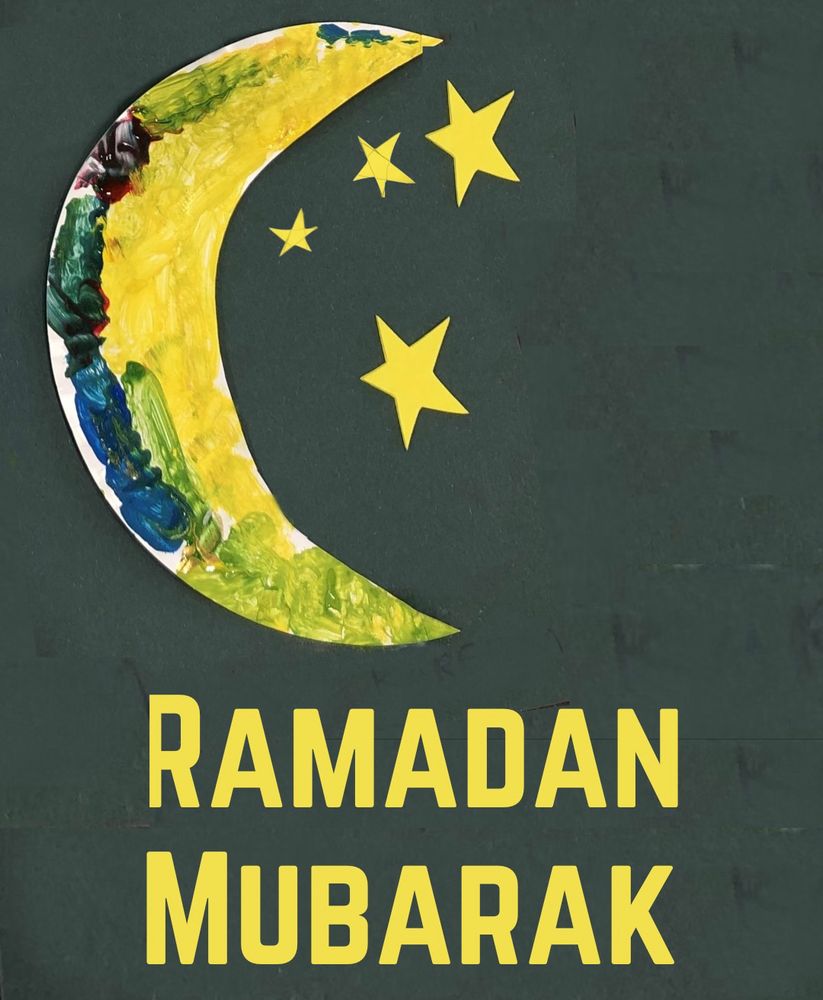 A crescent moon with the text Ramadan Mubarak 