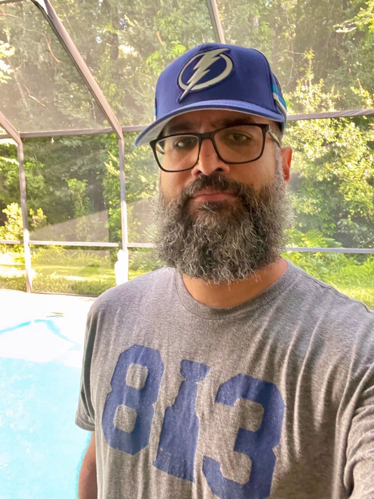 Me wearing my 813 shirt and Tampa Bay Lightning hat. The 1 in 813 is in the shape of the Stanley 