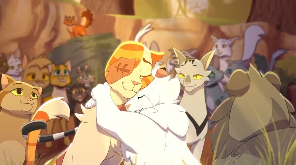 A frame from Rut, where Cloudtail hugs Brightheart tight while Thunderclan gathers around. It's very warm and happy. 