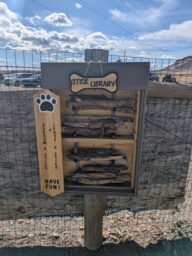 Stick library at a dog park with various sticks to borrow. 