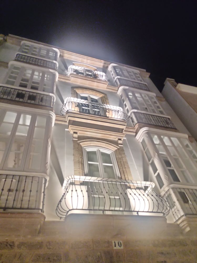 Some of the merchant houses feature wrought iron balconies designed to fit the wide dresses fashionable in the 18th century 