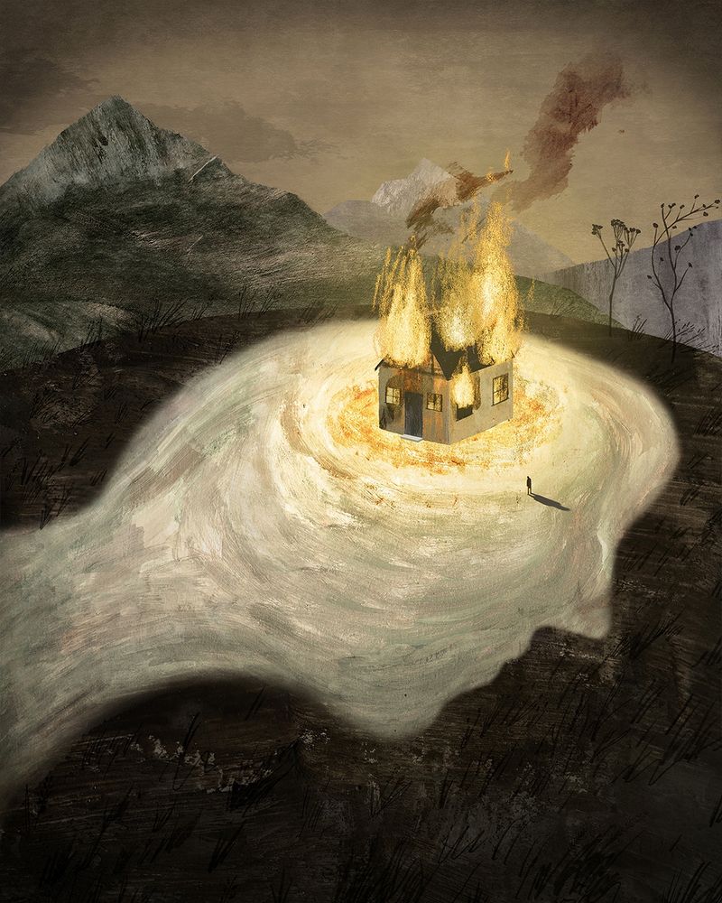 man watching a house burn with the fire illuminating the shape of a head to represent the pain of cluster headaches
