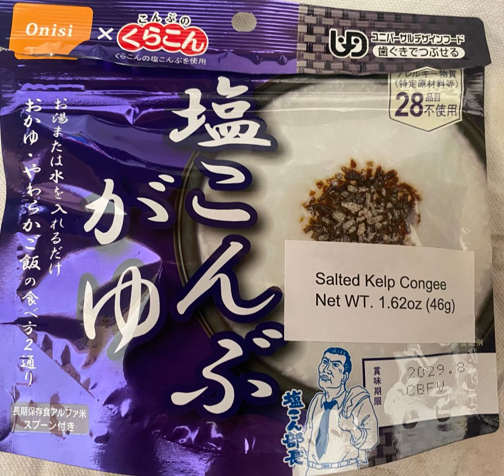 A packet of onisi salted kelp congee. There is a weird unflattering caricature of a businessman on it 