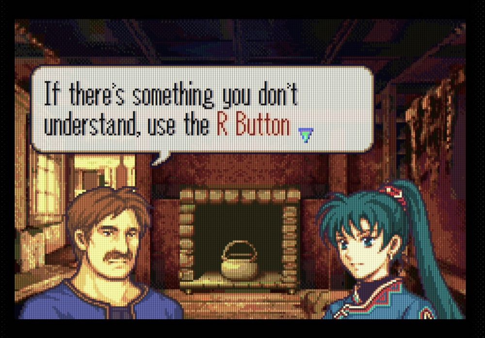 screenshot of Fire Emblem for the gameboy advance. A pixelated man with brown hair & moustache is talking to a woman when a long, dark green ponytail in a simple room with a large pot in the hearth. He’s saying: ‘If there’s something you don’t understand, use the R Button’