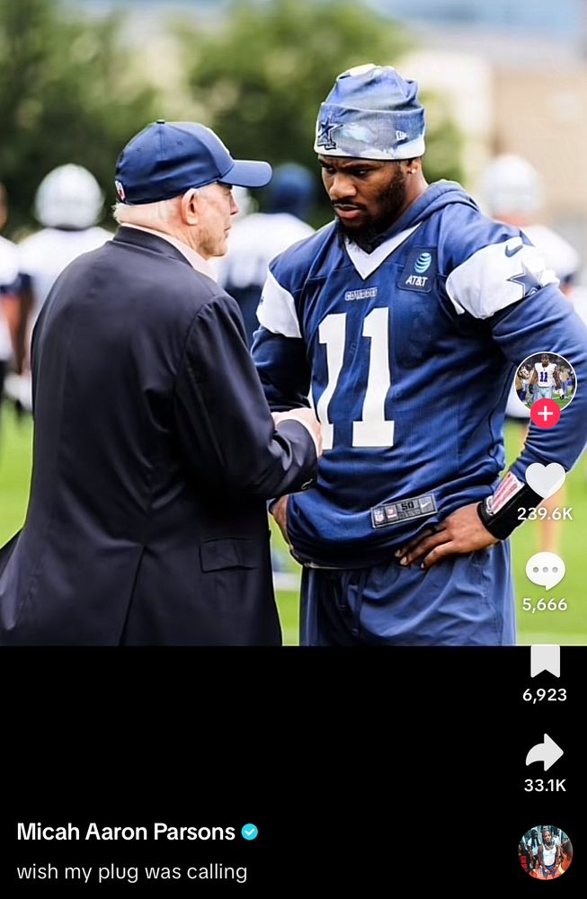 screenshot of micah parsons’ tiktok showing him standing next to jerry jones with the caption reading “wish my plug was calling” 