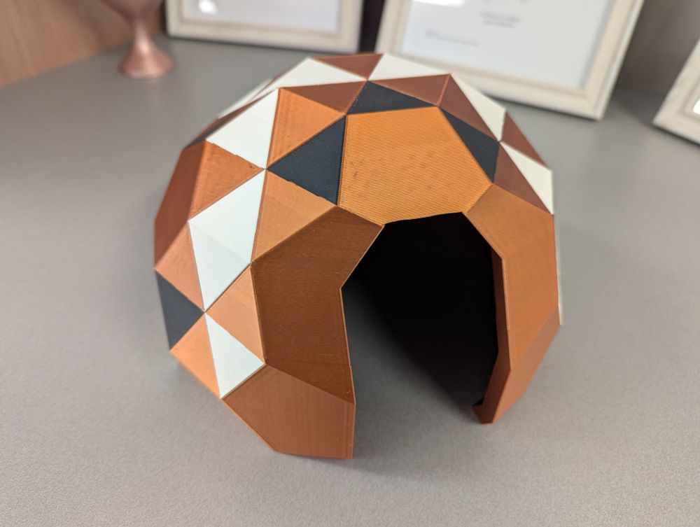 A 3D printed reference model of the geodesic dome build.  Printed on a Bambu Labs 3D printer in bronze, black and white.