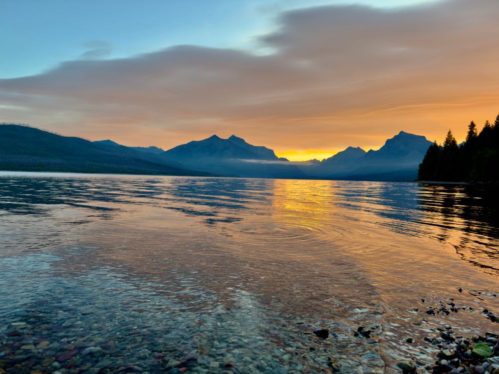 Lake McDonald at Glacier National Park during the peak color moments of sunrise. 