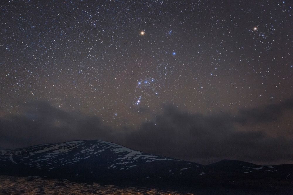Orion the mighty hunter over the Cairngorm mountain range. 