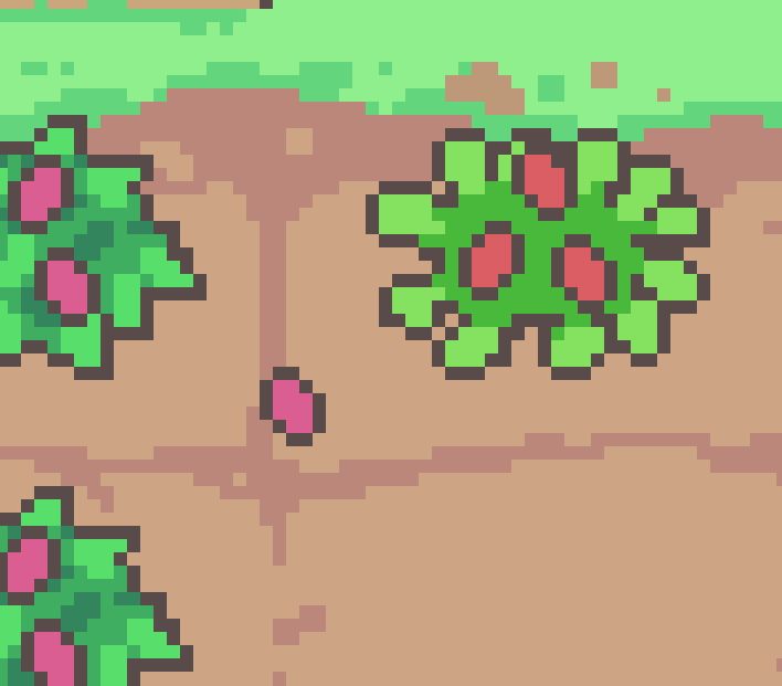 An attempt at a strawberry bush - looks like it came from outer space. About 10 green leaves sticking out that look like limbs and 3 red eyes that are meant to be strawberries..