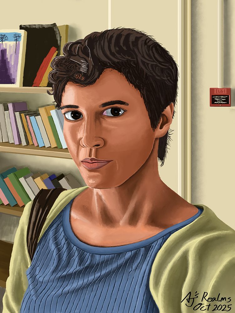 A portrait of a short-haired, brunette woman in front of a bookshelf.