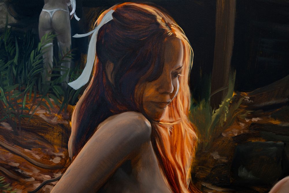 Portrait of a woman in 3/4 profile looking over her shoulder in a natural setting with sun filtering through her hair