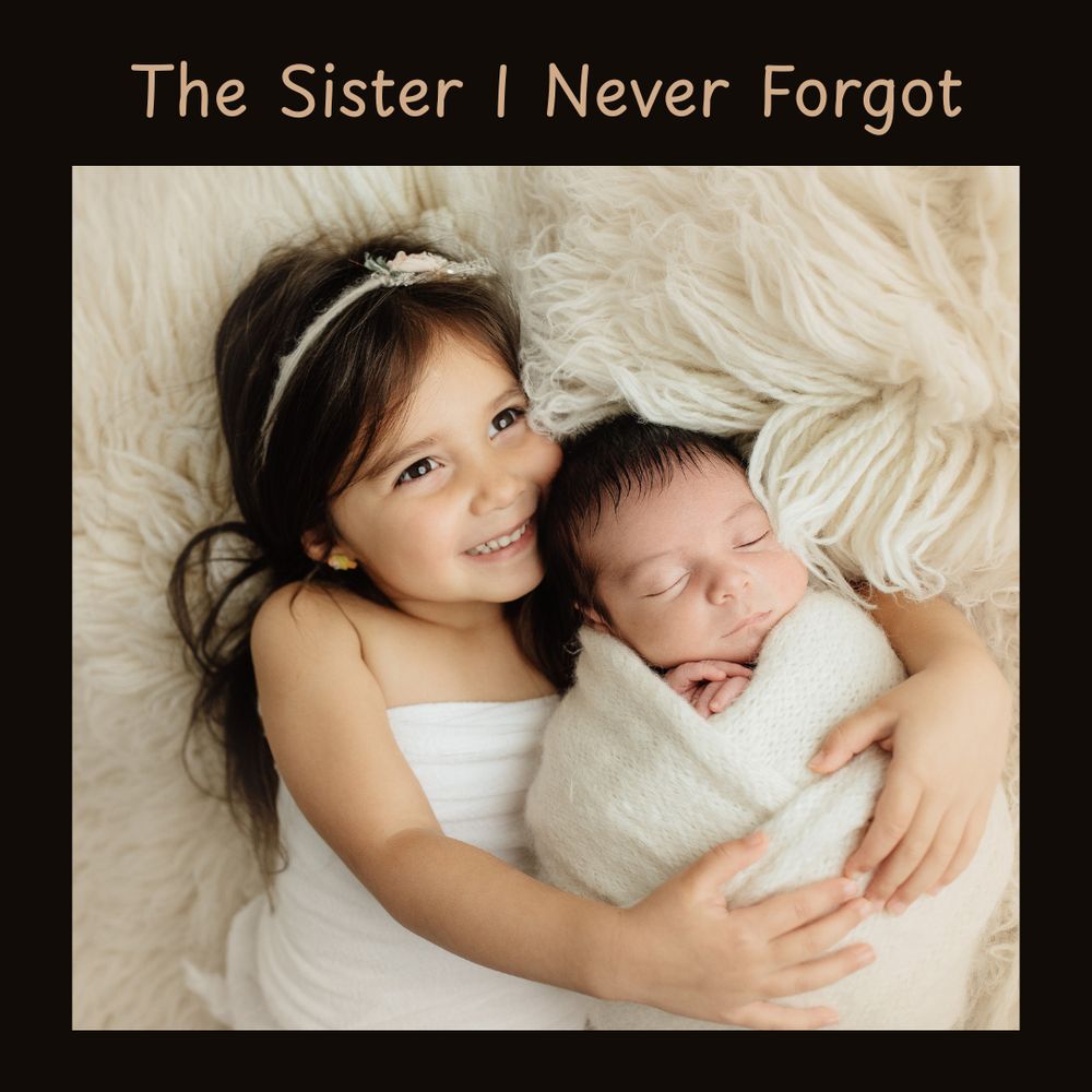 Toddler holds her baby sister