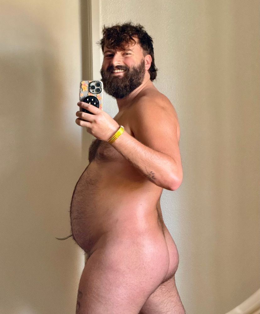 Hairy man showing bum